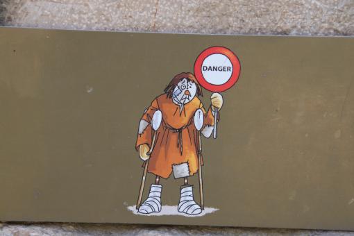 Free Stock Photo of Funny sign in a ruined castle