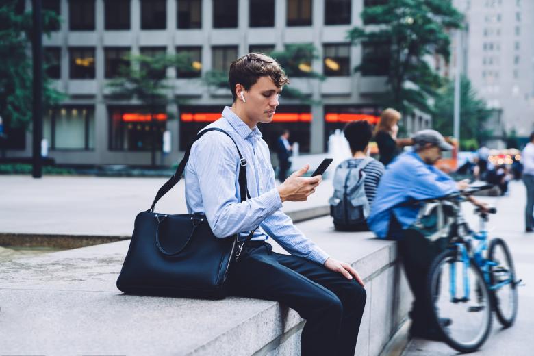 Free stock image of Young Man Looking at his Phone created by Miraslava