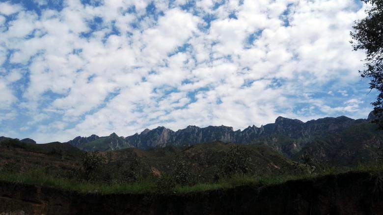 Free stock image of Mountains and clouds created by HongFei Li