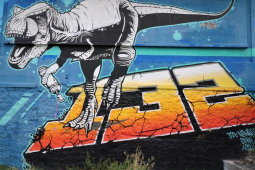 French graffiti of dinosaur 