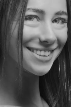Smiling Girl Portrait in Black and White - Free Stock Photo