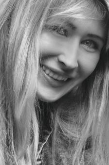 Free Stock Photo of Smiling Woman with Blond Hair - Black and White