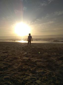 Man Standing on Beach - Silhouette - Free Stock Photo