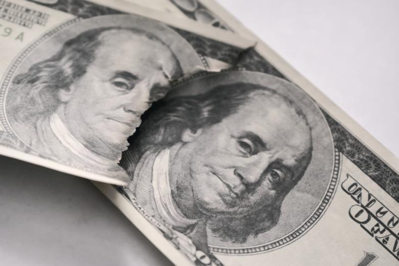 Free stock image of US dollars and Benjamin Franklin's face close-up created by NomeVizualizzato