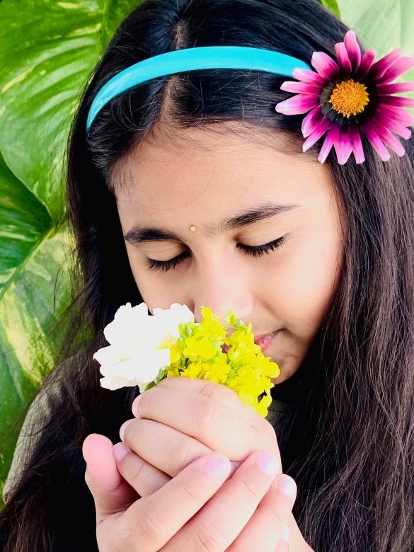 Free stock image of Indian girl smelling flowers created by Atul Saini