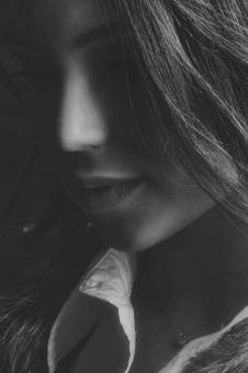 Free Stock Photo of Dark Portrait of Young Woman - Monochrome