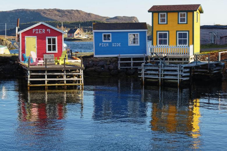Free stock image of Colorful Cabins on Pier Side created by Geoffrey Whiteway