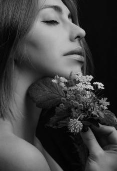 Free Stock Photo of Girl with Flower and Closed Eyes - Black and White Portrait
