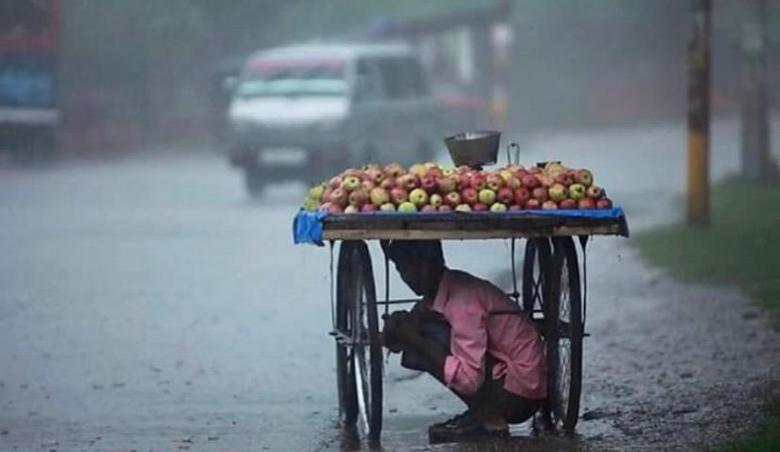 Free stock image of A Poor Vendor is Hiding from Rain created by SK