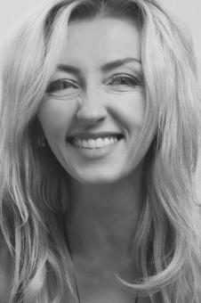 Free Stock Photo of Smiling Blond Girl Portrait - Monochrome
