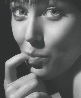 Free Stock Photo of Girl with Finger in Mouth - Monochrome Portrait