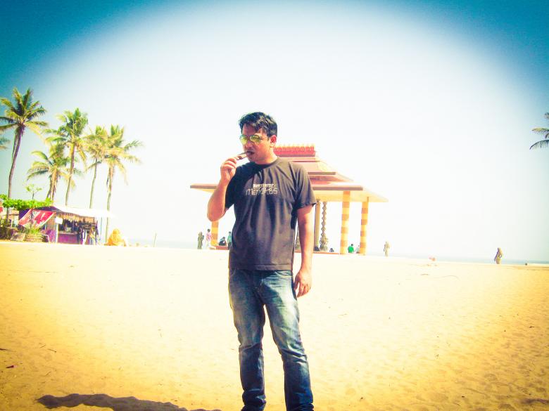 Free stock image of Man Eating Ice Cream on Beach created by Moon  Bhuyan