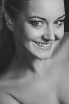 Free Stock Photo of Smiling Woman - Monochrome Portrait