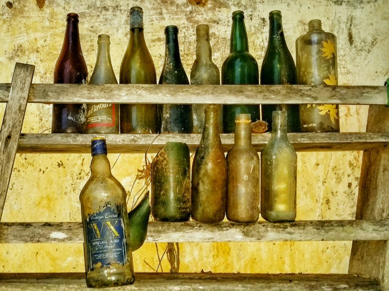 Free stock image of Old Bottles in a rack created by Nushrath Ahamed