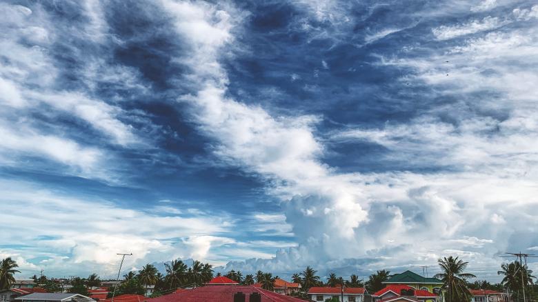 Free stock image of Blue Sky and Clouds Over Buildings created by Madhu Singh
