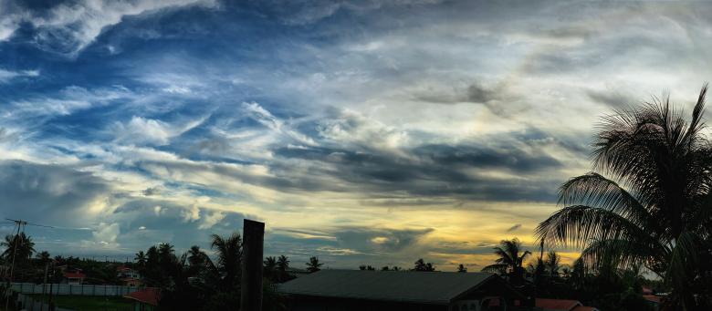 Free stock image of Sunset Sky Over House Roofs created by Madhu Singh