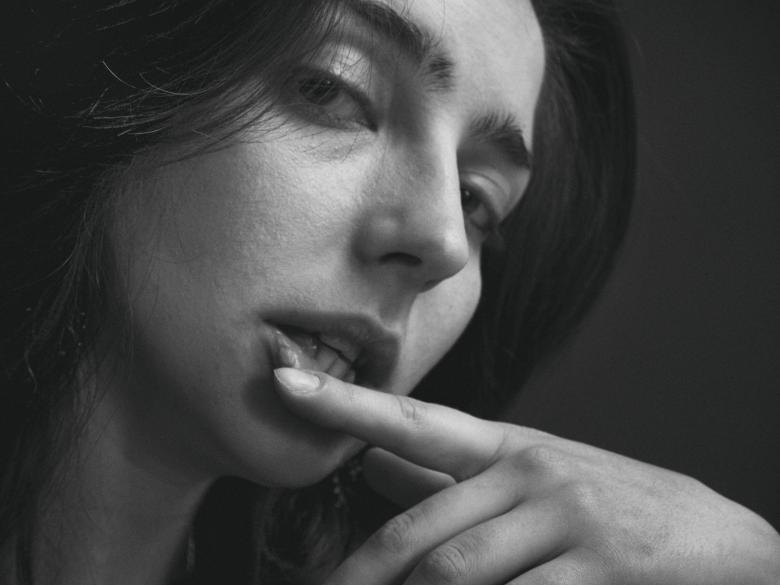 Free stock image of Female with Finger on Lips - Monochrome created by Alexander Krivitskiy