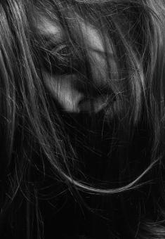 Free Stock Photo of Dark Portrait of Girl - Hair Covering Face