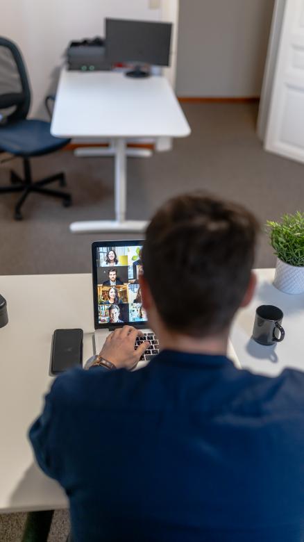 Free stock image of Man on Conference Call - Backside - Screen in Focus created by Maxime