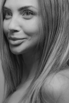 Free Stock Photo of Smiling Girl - Blond Hair - Monochrome