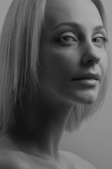 Free Stock Photo of Blond Girl Studio Portrait in Black and White