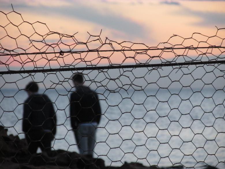 Free stock image of Sunset walk Behind the Fence created by Michiru Maeda