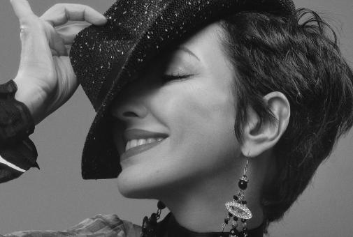 Free Stock Photo of Smiling Girl with Hat - Monochrome Portrait
