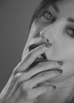 Free Stock Photo of Monochrome Portrait - Female with Hands on Face