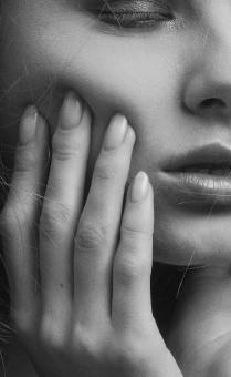 Free Stock Photo of Fingers on Chin - Girl Portrait - Monochrome