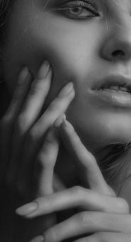 Free Stock Photo of Girl Portrait - Fingers on Chin - Monochrome