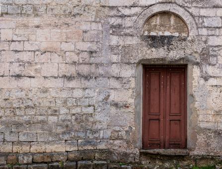 Free Stock Photo of  old door in a stone wall