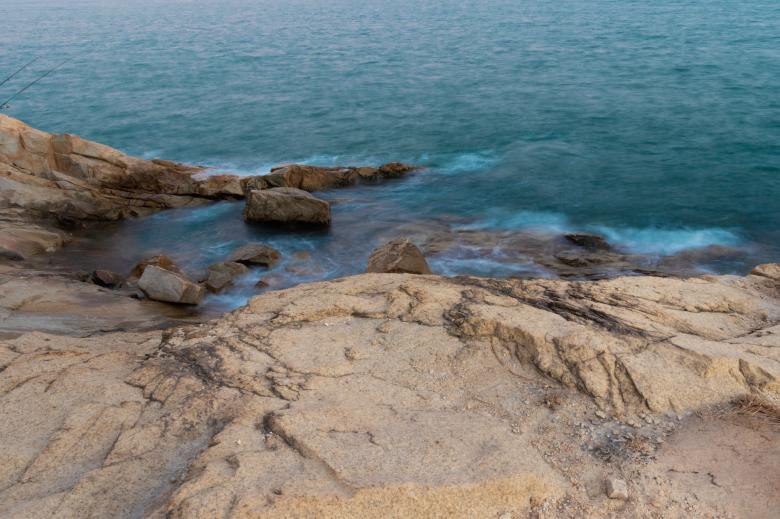 Free stock image of Small waves hitting rock on the beach created by Ben Wong
