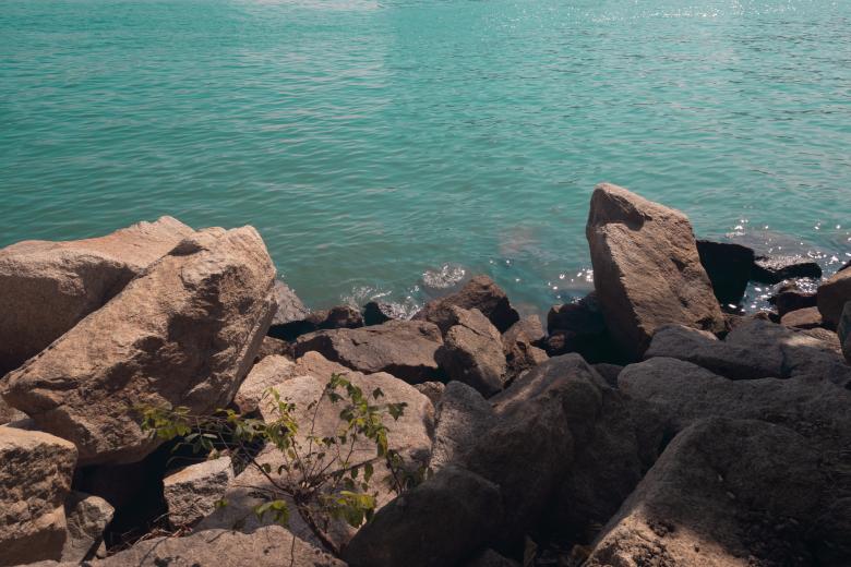 Free stock image of Small waves hitting rock on the beach created by Ben Wong