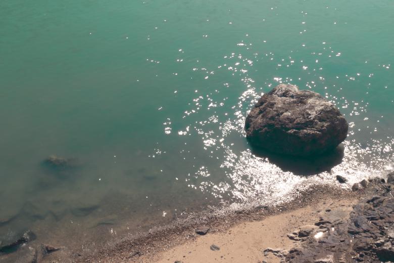 Free stock image of Small waves hitting rock on the beach created by Ben Wong
