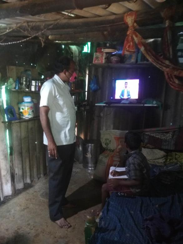 Free stock image of Digital lesson watched by 3rd class boy created by Kanduri Narasimha Charyulu