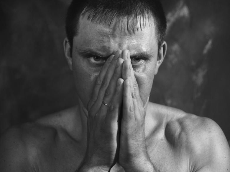 Free stock image of Man covering face created by Alexander Krivitskiy