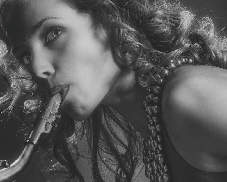 Free stock image of Saxophone player created by Alexander Krivitskiy