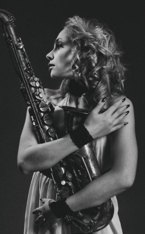 Free stock image of Female Saxophone Player created by Alexander Krivitskiy