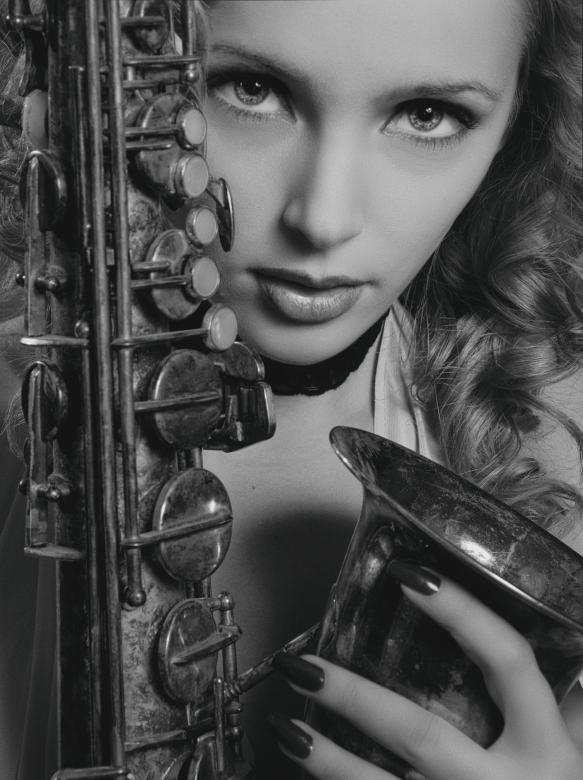 Free stock image of Female Sax Player created by Alexander Krivitskiy