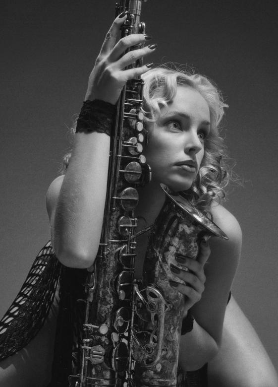Free stock image of Saxophone player created by Alexander Krivitskiy