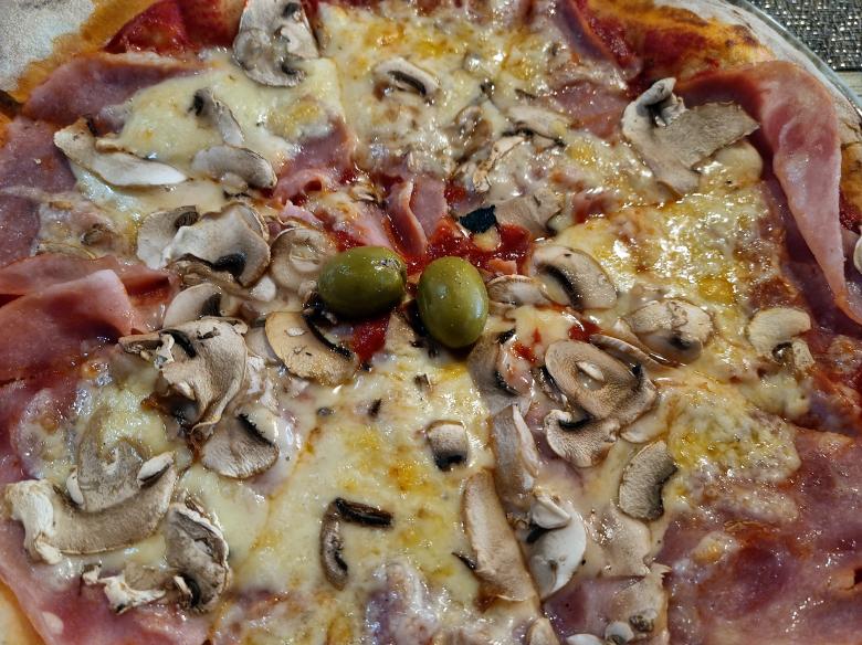 Free stock image of Pizza closeup created by Alen