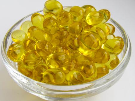 Yellow capsules with vitamin D - Free Stock Photo