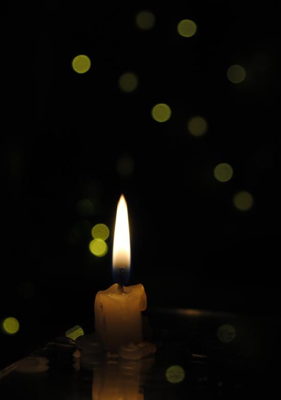 Free stock image of Small candle with light yellow spots on light background created by nl photography