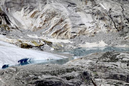 Free Stock Photo of SLOW MOTION ICY LAKE IN WINTER AT TOP OF ALPS
