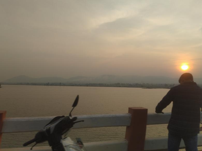 Free stock image of Watching Sunset and River flowing under the bridge created by Nagabhushan Biliangadi