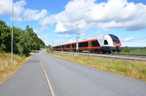 Free Stock Photo of A fast train is passing by in a great landscape 