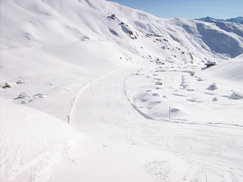 Free stock image of A skiing slope high in the mountains created by Erik Schellingerhout