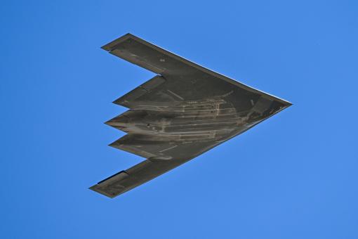 A B-2 Spirit makes a low pass flyover during the 2024 Warriors Over