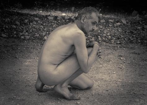 Simple mature man in the woods