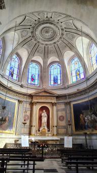 Church Interior with Dome Blue Stained Glass Windows and Central Altar